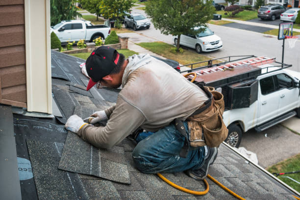 Professional Gutter Installation technician working in Spring Lake, MI